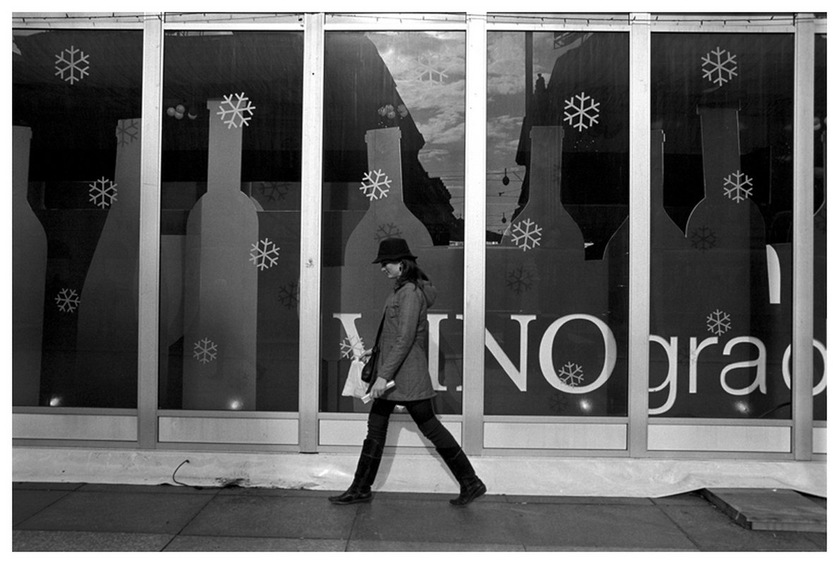 Stanko Abadžic - Woman in Front of Snowflake Window Display, Zagreb,Croatia