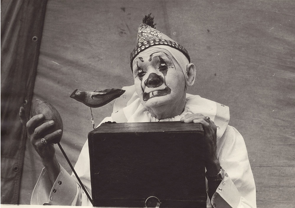 Kenneth Heilbron - Millers Bros. Circus, St. Louis, MO (clown and camera with football style shutter and bird)