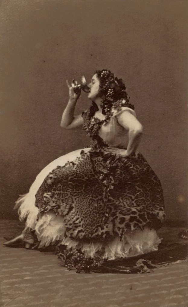 Andre Adolphe-Eugene Disderi - Portrait of Actress Louise Charlotte Abingdon-Legaigneur Drinking Wine in Dress Decorated with Grapes Andre Adolphe-Eugene Disderi - Portrait of Actress Louise Charlotte Abingdon-Legaigneur Drinking Wine in Dress Decorated with Grapes