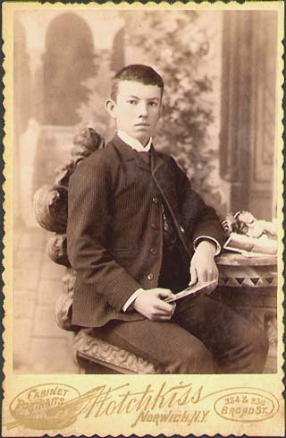 Boy with Cabinet Cards
