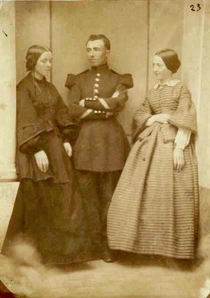 Portrait of Two Women and a Military Man